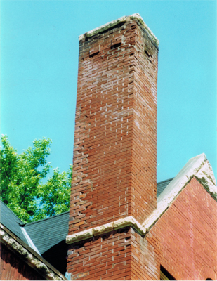 This is a photo from before we repaired the chimney. Most of the mortar joints on the top and corners are empty and some bricks spalling.