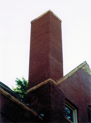 The chimney repair is not noticable as the brick match perfectly with the rest of the building as well as the mortar joints.